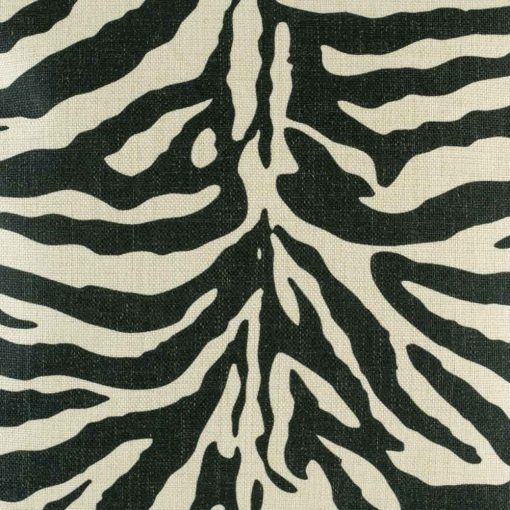 Close up showing black and white zebra print cushion cover