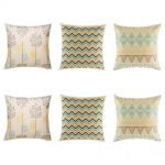 Appealing 6 cushion cover set with chevron, aztec and tree designs in blue, yellow and grey colours