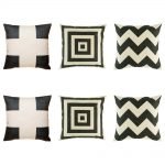 6 corby cushion collection with 2 cushions with black cross motif, black chevron and repeating black square pattern