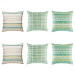 Soft 6 cushion cover set with aztec pattern in grey and teal x2, teal criss cross lines x 2 and an aztec pattern in teal and yellow x 2