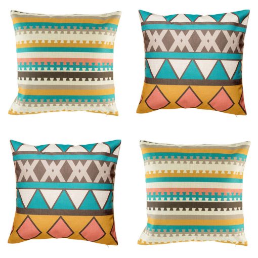 4 cushion cover set with bold yellow, grey and blue colours in geometric patterns