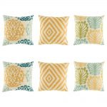 6 cushion cover set with 3 designs in yellow diamond, yellow, dark blue and light green royal swirl and a fern style