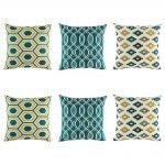 Yellow, blue and grey cushion cover set with striking swirl, repeating pixel and hexagon design
