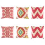 Predominantly pink and red cushion cover set with some light blue and yellow colouring