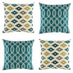 Collection of 4 cushions with blue and yellow pattern