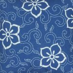 Close up of blue and white floral cotton linen cushion
