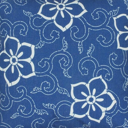 Close up of blue and white floral cotton linen cushion