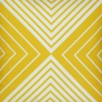 Close up of velvet cushion cover with yellow illusion design