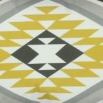 Close up of aztec inspired velvet cushion cover