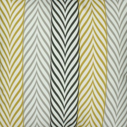 Close up of striped monochromatic yellow velvet cushion