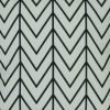 Close up of zigzag and stripe velvet cushion in black and white