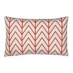 Red and white rectangular velvet cushion with chevron design