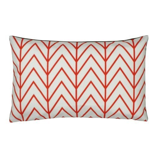Red and white rectangular velvet cushion with chevron design