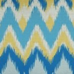 Close-up photo of rectangular chevron cushion cover with blue and yellow colours