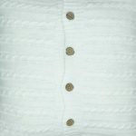 Additional close-up photo of white cable knit cushion cover with buttons