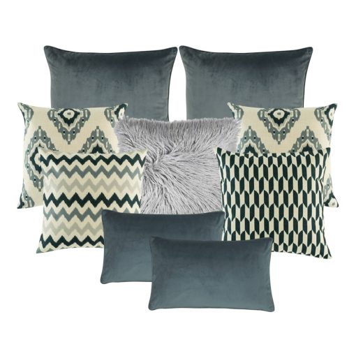 Photo of a set of 9 cushion covers featuring two square grey covers, four cushions with patterns, two rectangular grey cushions and one grey faux fur cushion.
