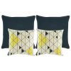 A set of 4 square cushions in blue and white colours with triangle patterns