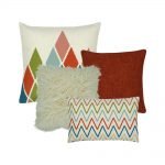 A mix of rectangular and square cushion covers with diamond and zigzag patterns
