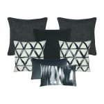A set of 7 rectangular and square dark grey and white cushion covers
