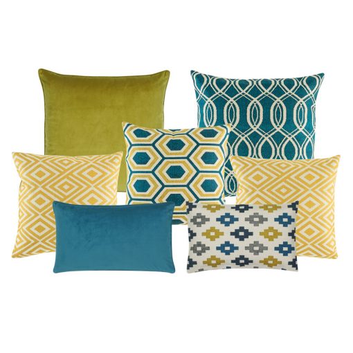 A set of 6 square and rectangular cushion covers in blue and gold colours and with diamond, solid and spiral patterns