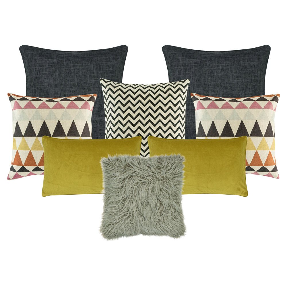 A collection of 8 cushion covers with grey and mustard colours and in rectangular and square shapes