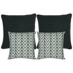 A collection of black and white cushion covers