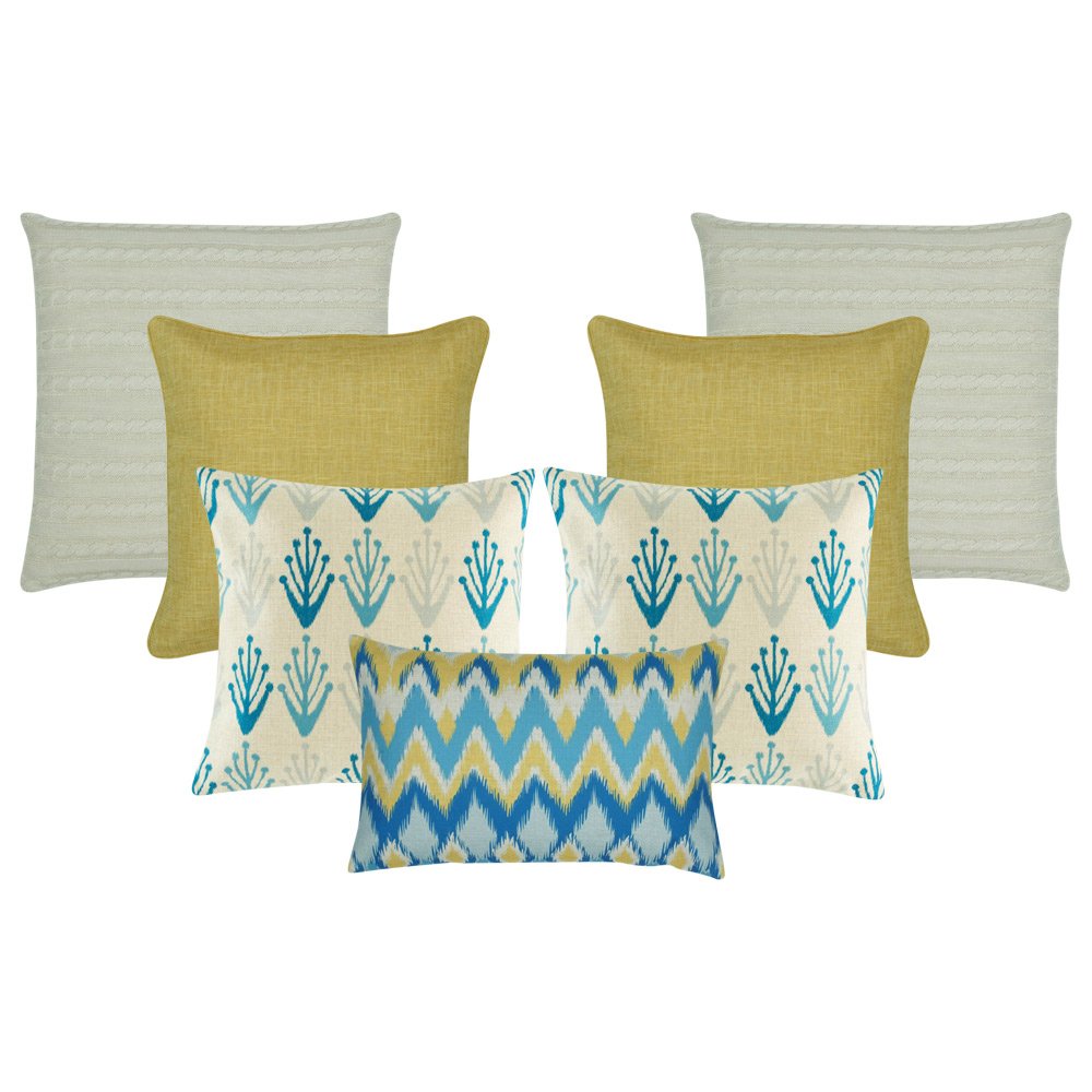 A set of 7 cushions covers with solid, modern floral, cable knit and chevron patterns and in gold and blue colours
