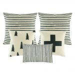 Image of 5 white and grey cushion covers with cross, pine and stripes design