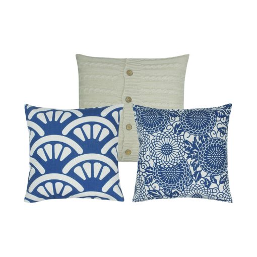 A collection of 3 square blue and white cushion covers in shell, floral and cable knit patterns