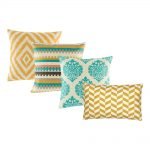 A collection of gold, teal cushion covers in square and rectangular design