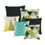 A set of 6 black and white cushions with triangle patterns