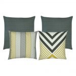 A mix of four square cushions in grey and gold colours with arrow patterns