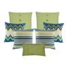 A collection of 7 green and blue , square and rectangular cushions with cable knit, lines, chevron and solid patterns