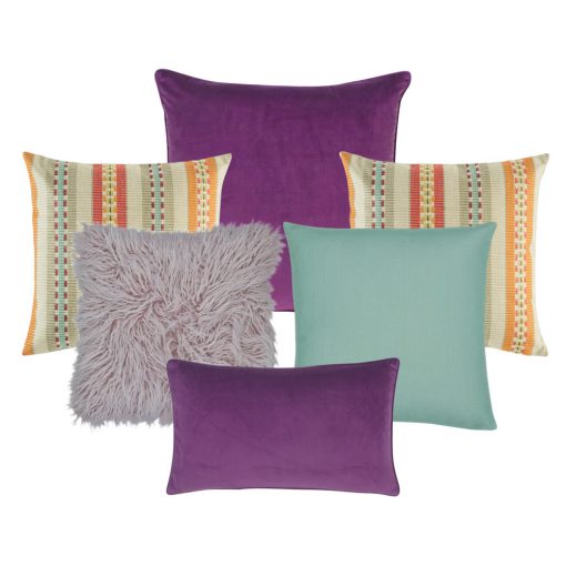 A collection of plum, lilac, teal and multi-colored cushions in square and rectangular shapes