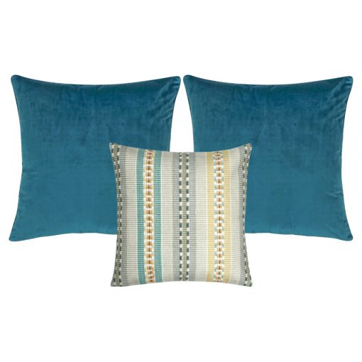 A set of 3 cushions with blue and grey colours