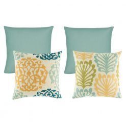 A set of 4 square cushion covers with floral and solid patterns with duck egg, orange and olive colours