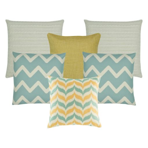 A set of 6 cushions in gold and teal colours with chevron and solid patterns