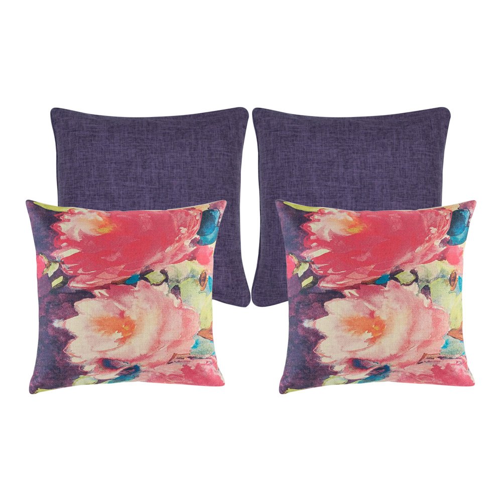 A collection of four purple cushion covers with floral design