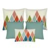 A set of 5 rectangular and square cushions in duck egg colour and diamond patterns
