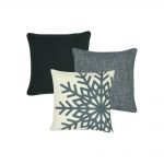 A set of three square grey cushions