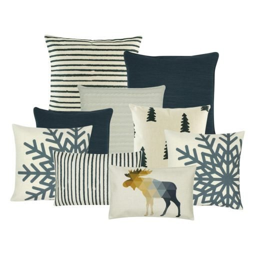 A set of six cushion covers with moose, stripes, pine and snowflakes design and in grey and white colours