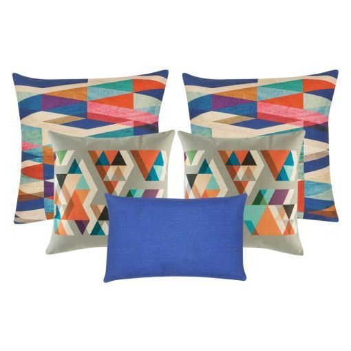 A collection of five square and rectangular blue and grey cushions with triangle patterns