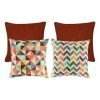 A set of 4 rainbow and red cushions with diamond and chevron patterns