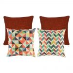 A set of 4 rainbow and red cushions with diamond and chevron patterns