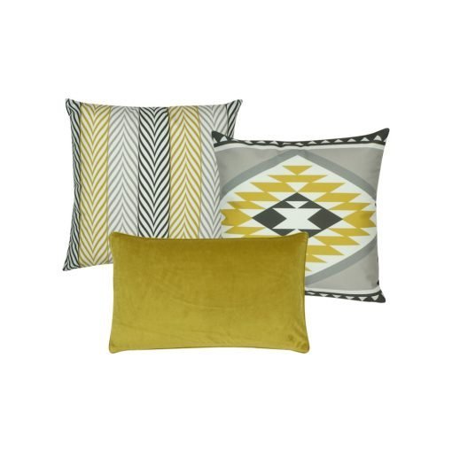 A collection of 3 gold and grey cushions with aztec tribal patterns