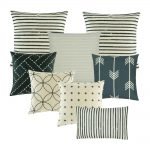 A set of 8 square and rectangular cushion covers with stripes, lines, arrows and cross designs