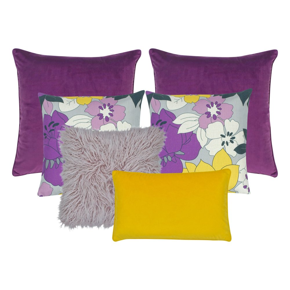 A collection of 6 purple and yellow cushion covers with floral design