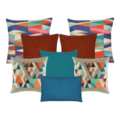 A set of 8 cushions with burnt orange, grey, blue and teal colours and with diamond patterns