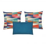 A set of 3 teal and multi-coloured cushions in square and rectangular shapes