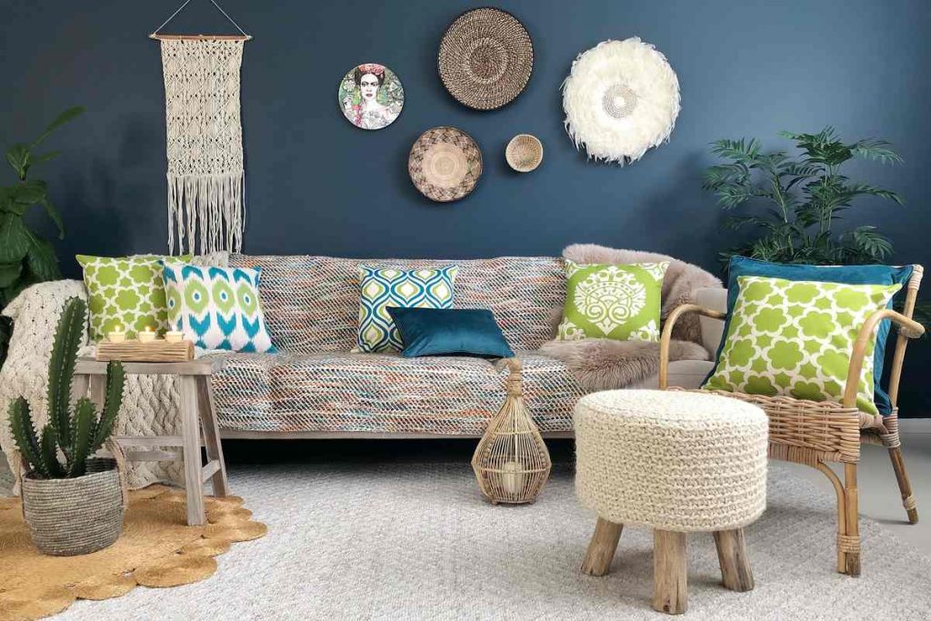 Boho chic styled room with teal and green cushions